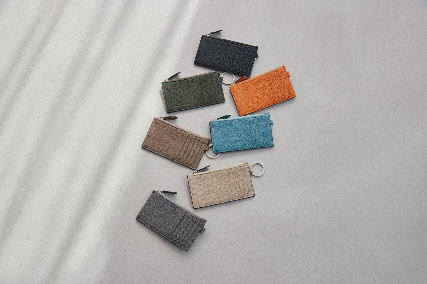 Mini zip wallet with key ring in shrink leather